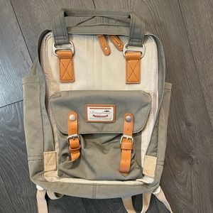 Doughnut Macaroon two tone backpack with laptop sleeve and leather straps